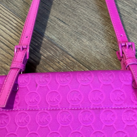 Michael Kors bright pink, has handles and also strap that comes off. - Picture 2 of 8